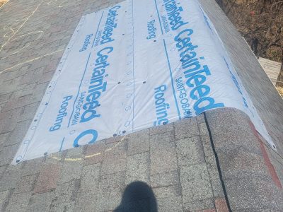 moline roofing replacement - peak of roof being prepped, during