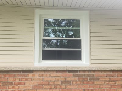 coal valley window replacement - exterior view of new white bedroom window, after