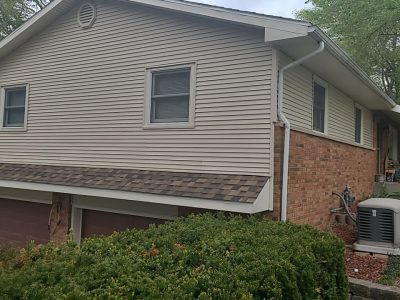 coal valley window replacement - exterior side view of two bedroom windows, before