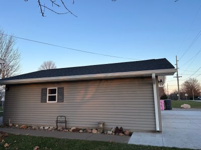 aledo roofing installation - garage with new black roof, after