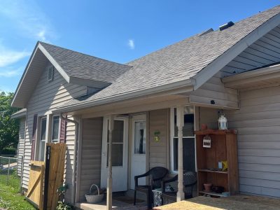 milan roofing installation - side view of project house with new roof, after