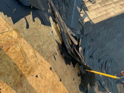 milan roofing installation - old exposed broken roof tiles, during