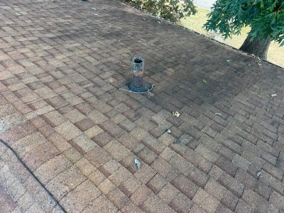 east moline roofing installation - old roof with bad weather damage, before