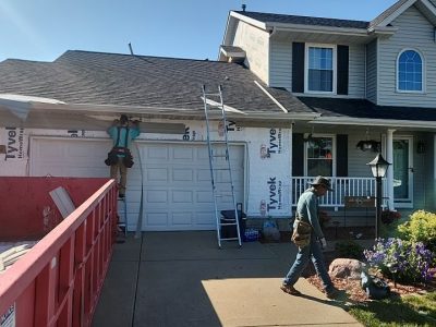 davenport siding installation - street view of siding construction, during - 2