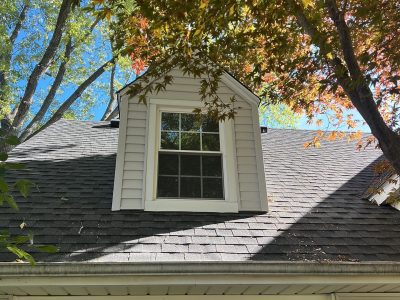 rock island roofing installation - front yard view of new siding and roof install, after
