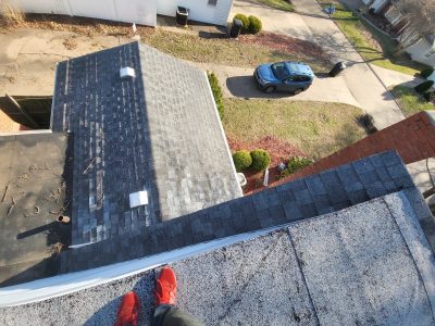rock island roofing installation - aerial view of missing roof pieces, before