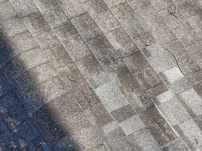 rock island roofing installation - broken roof tiles on house, before