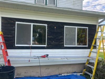 Andalusia Window Installation - outside replacing slider windows, during