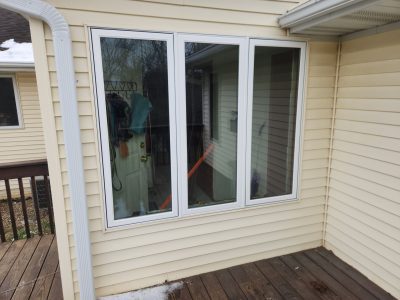 swisher window installation - close-up view of three long patio/kitchen windows, after