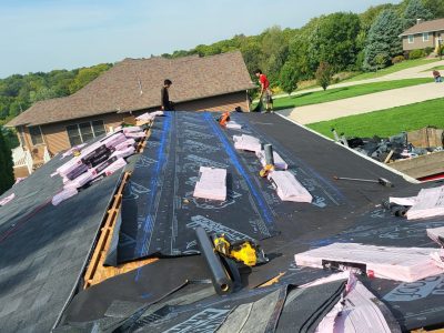 orion roofing replacement - new roof layers being added, during