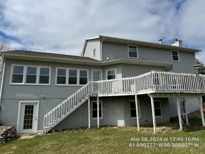 long grove window replacement - backyard view of house with new white windows, after