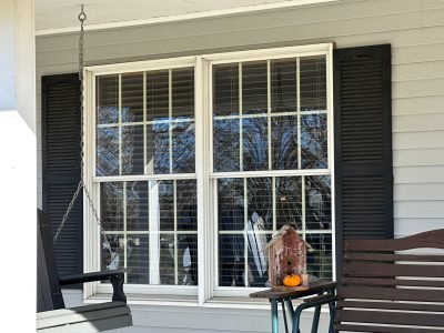 long grove window replacement - outside view of front porch windows, before