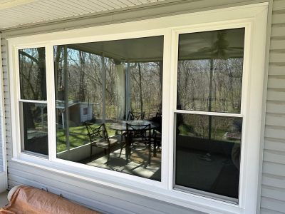 east moline window replacement - outside view of new large white bay window, after