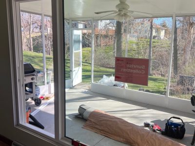 east moline window replacement - inside view of newly-installed bay window with sticker, during
