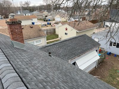 moline roofing installation - new side of gray roof, after
