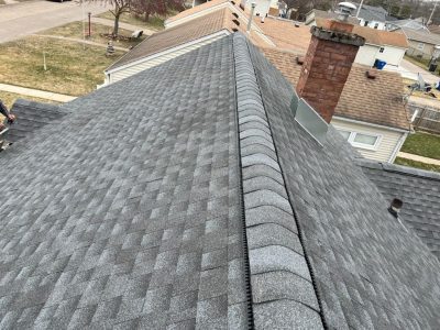 moline roofing installation - new peak of gray roof, after