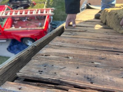 moline roofing replacement - worker replacement broken roof, during