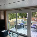 east moline patio door replacement - indoor side view of new glass patio doors, after
