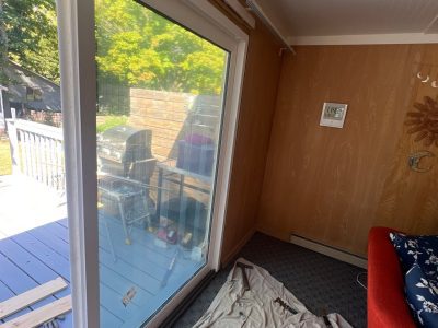 east moline patio door replacement - protective tarp near old patio door, during