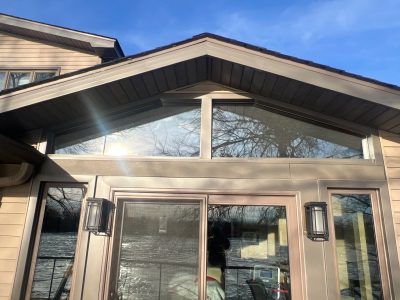 moline patio door replacement - outside left view of new glass triangle windows above patio doors, after