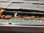 east peoria gutter cover installation - leaves on top of gutter cover, after