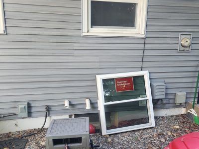 Rock Island Window Installation - working outside Double-Hung replacement, during