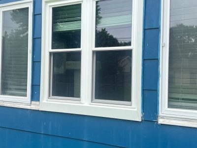 East Moline Window Installation - outside view Double Hung window pair, after