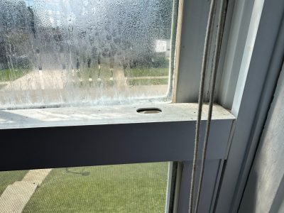 Kewanee Window Replacement - inside window holes, before