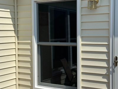 Le Claire Window Replacement - outside porch double-hung windows, after