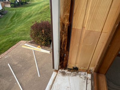 Le Claire Window Replacement - inside double-hung window closeup from ladder, during