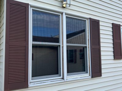 Le Claire Window Replacement - outside double-hung window pair, during