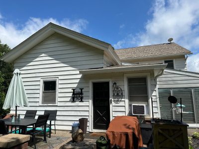 Taylor Ridge Window Replacement - outside from patio, before