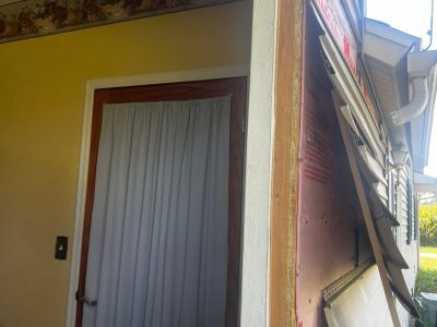 Ipava Window Replacement - outside cleaning window, during