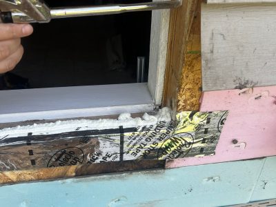 Ipava Window Replacement - outside sealing window, during