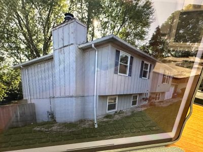Eldridge Siding Replacement , left front before