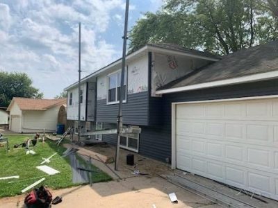 Eldridge Siding Replacement , front from side during