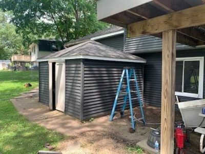 Eldridge Siding Replacement , rear shed during