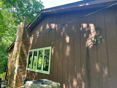 Moline Window Installation - outside rear bay window, before