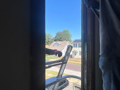 Pekin Window Installation - inside window cleanup, during