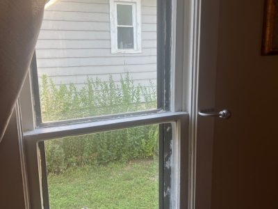 Freeport Window Replacement - inside cracked window, before