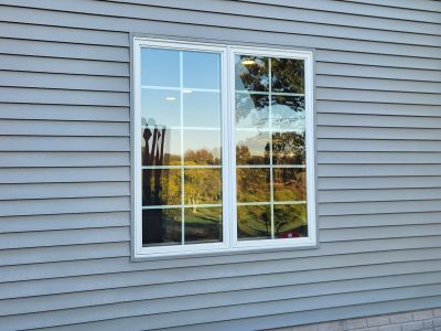 Bettendorf Window Contractor - outside casement window, before