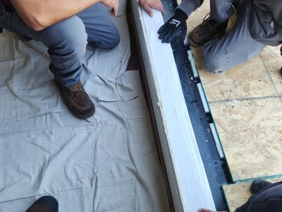 Bettendorf Window Contractor - closeup window sealing, during