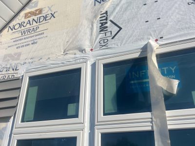 Bettendorf Window Contractor - outside bay window side, during